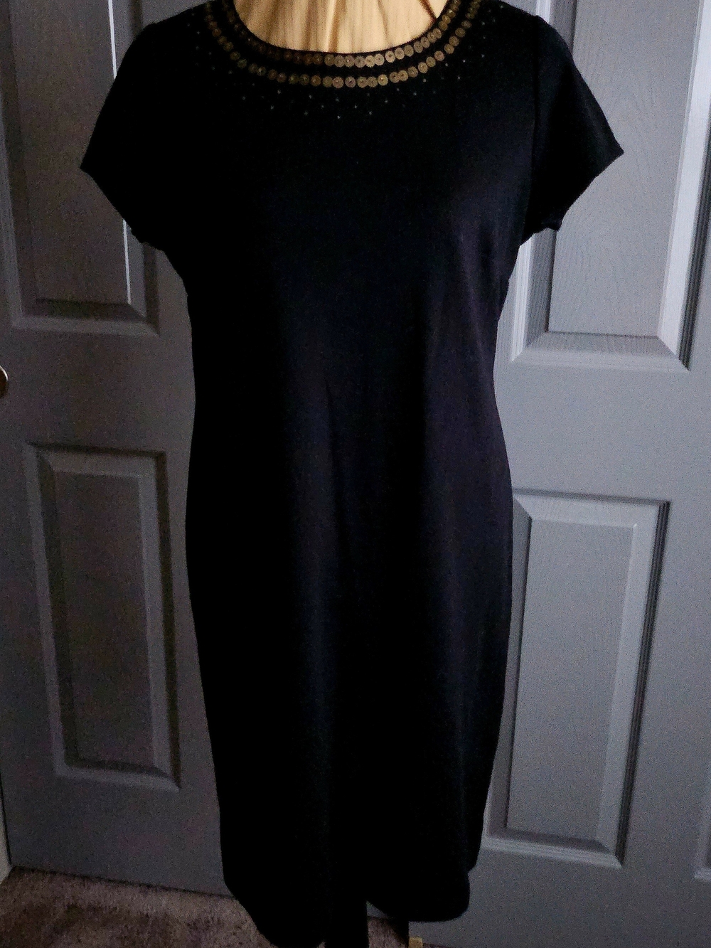 Classic Black Shift Dress with Decorative Neckline